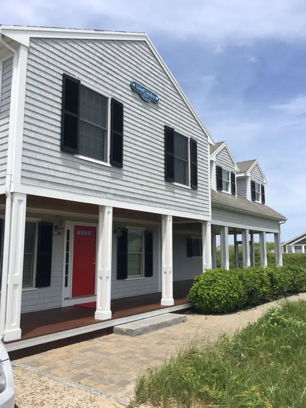 Gray home with red front door