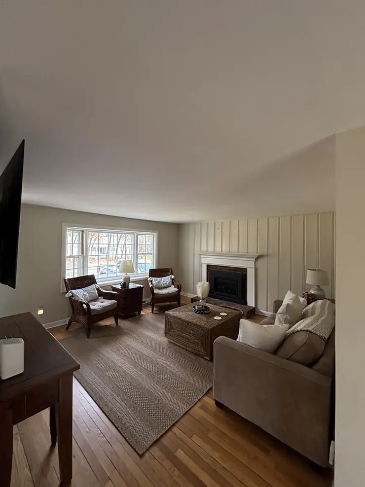 Living room with paneled wall